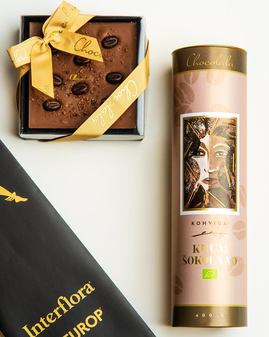 Hot chocolate with coffee and chocolate bar with liqueur filling